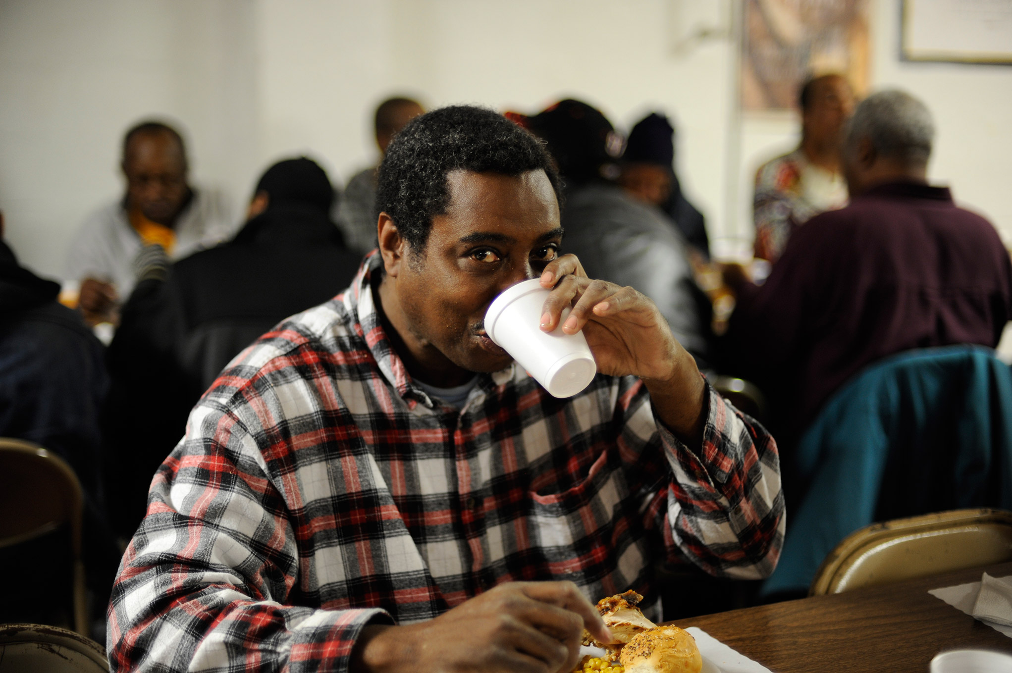 Man sitting and drinking