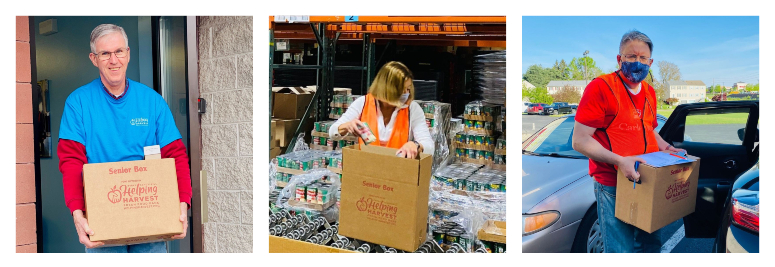 Three volunteers hold and pack senior food boxes